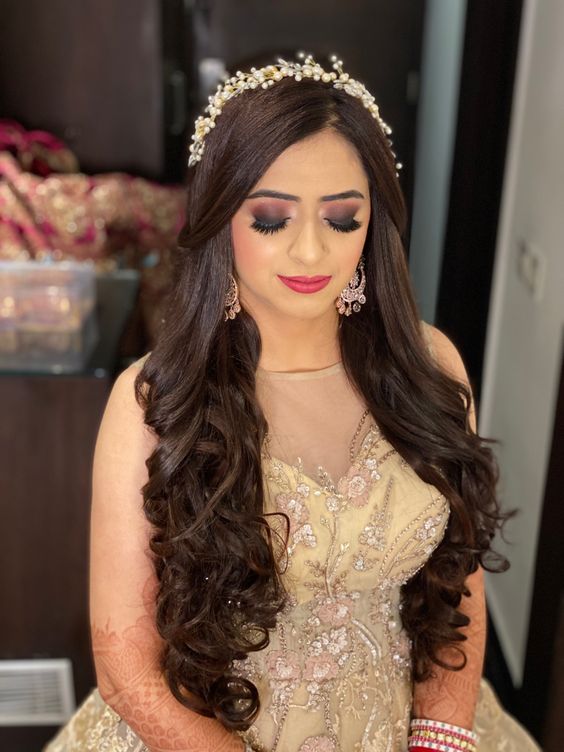 hairstyle with lehenga wedding  hairstyle with lehenga choli  hairstyle  with lehenga low buns  Hairstyles for gowns Indian wedding gowns Indian  bride