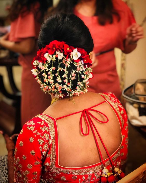 Trendy Floral Bun Hairstyles For Wedding