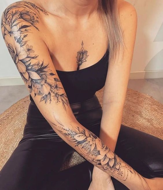 Female classy half sleeve tattoo