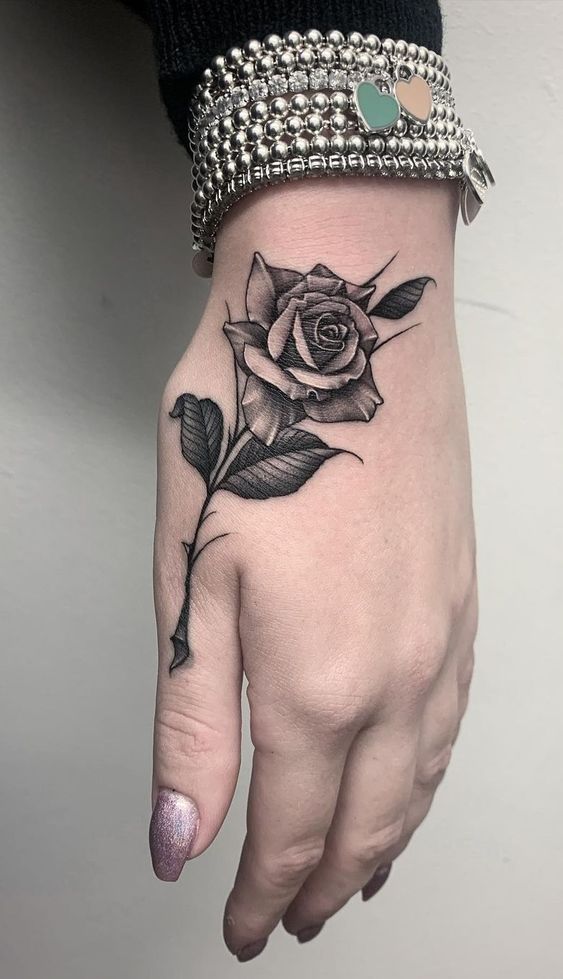 Tattoo uploaded by Tara  Rose hand rose handtattoo flower  Tattoodo