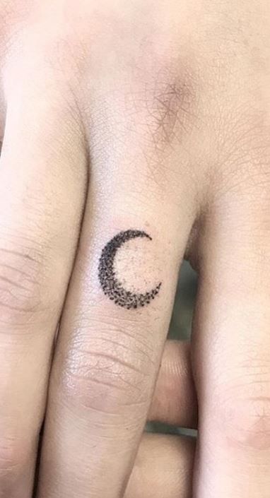 Small moon tattoo on the ankle