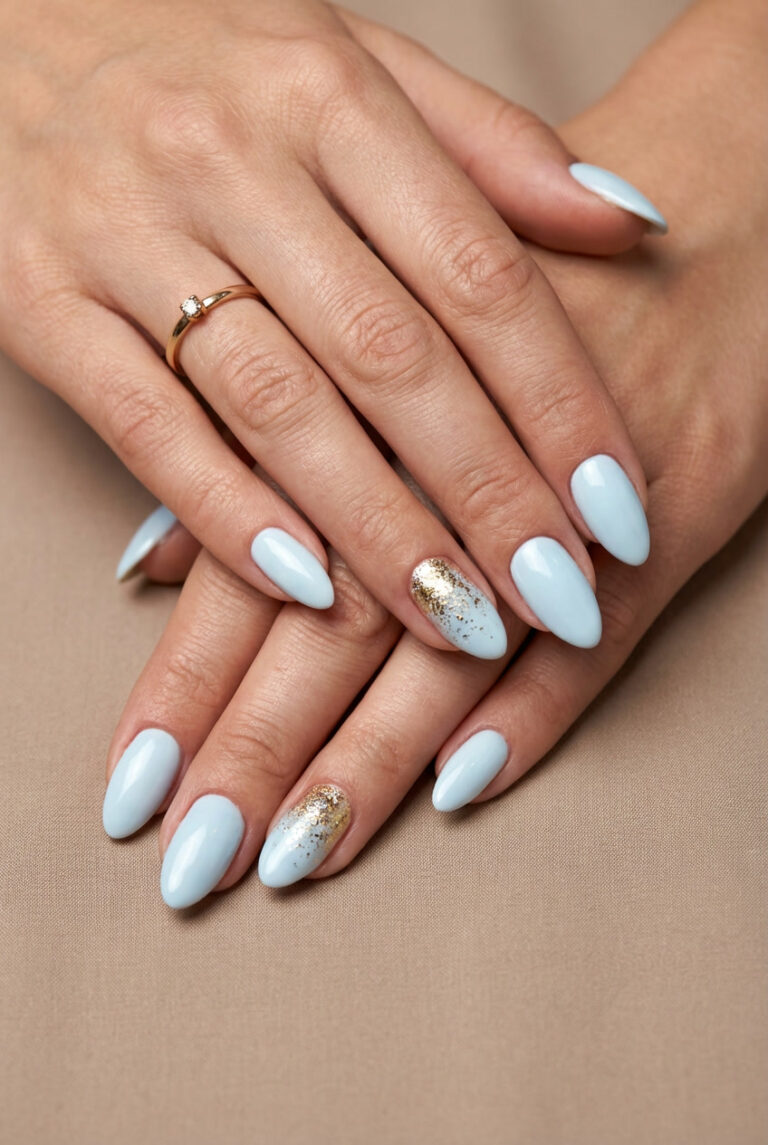 Pastel Blue Nails with Glitter Accent